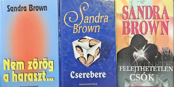 Sandra Brown - 3 db Sandra Brown romantikus reg�ny:  Cserebere +  Nem z�r�g a haraszt... + Felejthetetlen cs�k