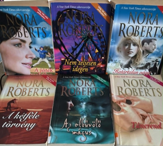 Nora Roberts - Nora Roberts könyvcsomag (6 darab) A játék szabálya; Nem teljesen idegen; A kétféle törvény; Az elbűvölő mágus; Táncrend; Határtalan vágy