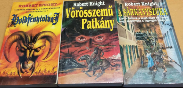 Robert Knight - Holdf�nytolvaj-tril�gia (Holdf�nytolvaj / V�r�sszem� patk�ny / A s�rk�nyszuka) - Osiris k�nyvek