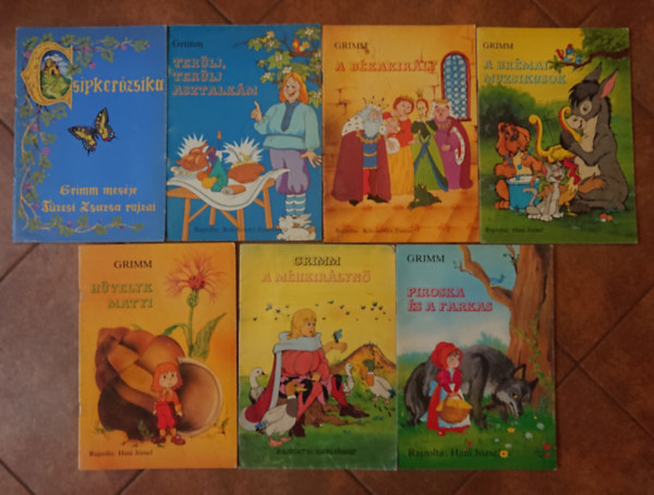 Haui József, Kricskovics Zsuzsnna Grimm testvérek - 7 mesefüzet a Grimm testvérektől: Piroska és a farkas, Hüvelyk Matyi, A méhkirálynő, Csipkerózsika, Terülj, terülj, asztalkám!, A békakirály, A brémai muzsikusok